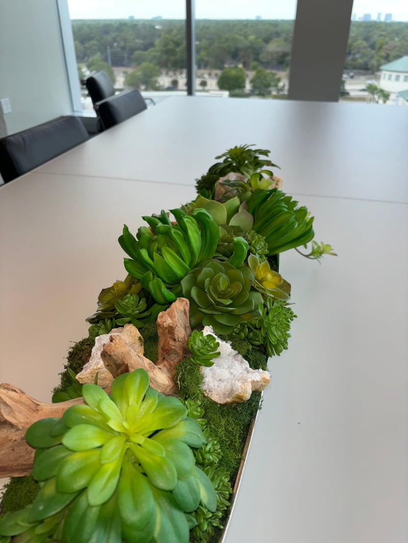 Succulent and crystal runner arrangement on a conference table