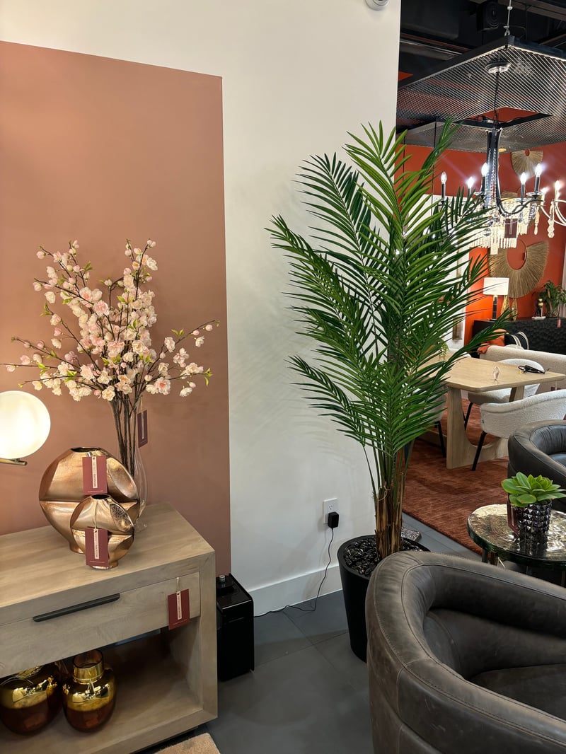 Palm and cherry blossom vignette in the showroom